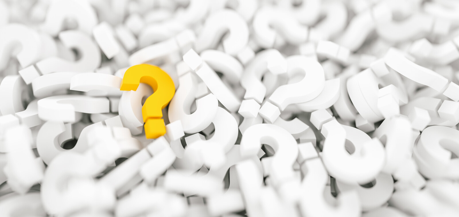Artistic 3D rendering of a pile of three dimensional questions marks.  All of them white except for one golden question mark.