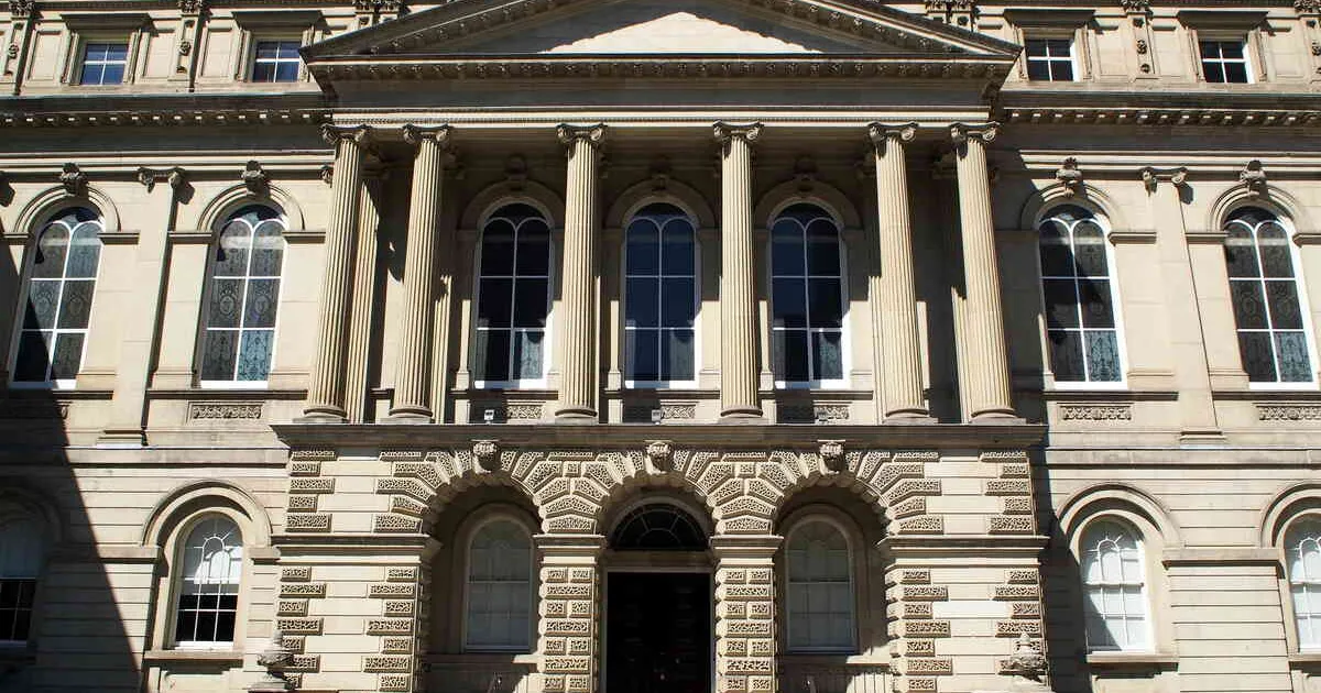 The front facade of Osgoode Hall in Toronto, Ontario, a late-Palladian style landmark building originally finished in 1832.